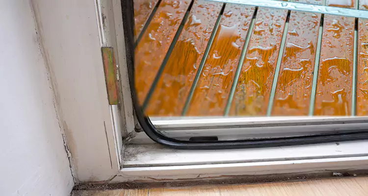 Water Leaking Wooden Patio Doors Repair in Stuart, FL
