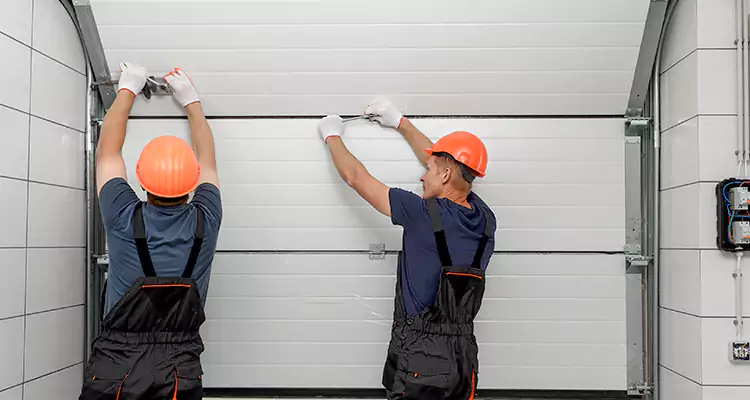 Garage Door Bottom Panel Repair in Stuart, FL